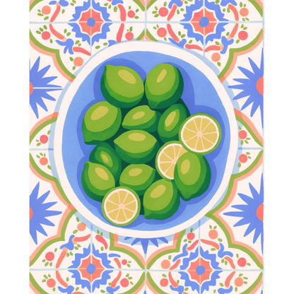 Illustration of green limes and a lemon on a blue plate with a colorful geometric border.